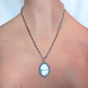 Distresses Manga Speach Bubble Meow Pendant in Silver Frame.